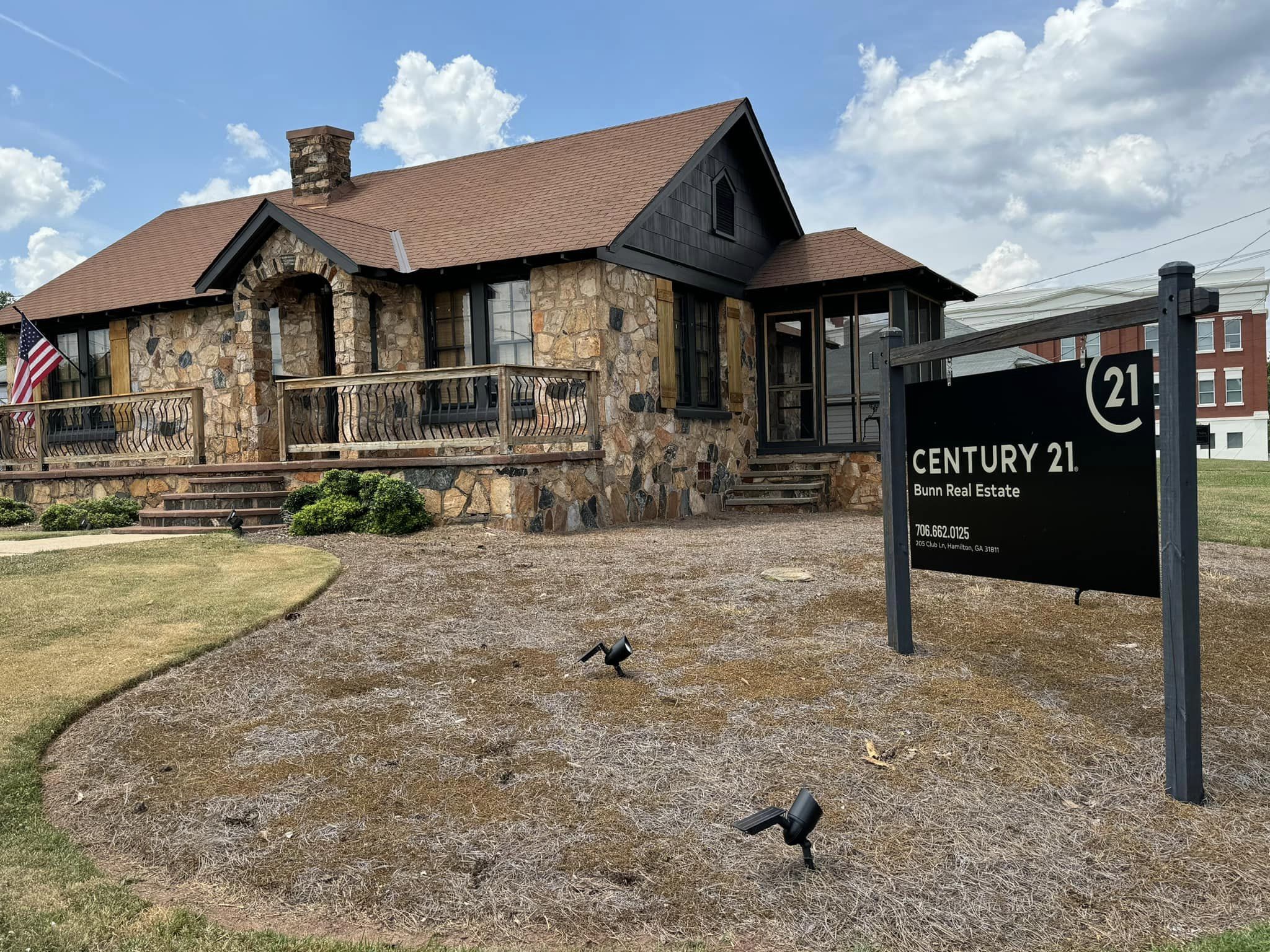 Century 21 Bunn Real Estate Office and sign